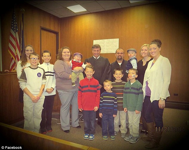 The family line up to celebrate Zayn's adoption being officially recognized. Melissa says Zayn is just over a year now and he teaches 'us patience and unconditional love daily and I can’t imagine life without him'