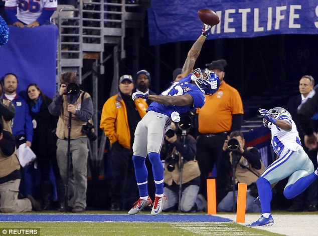 Incredible: New York Giants wide receiver Odell Beckham Jr scored a magnificent touchdown against the Dallas Cowboys with this gravity-defying catch, sparking dozens of memes