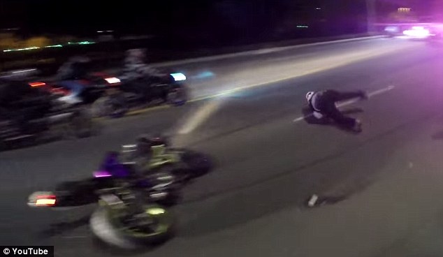 Ouch: The bikers abandon the man as they continue to try and escape police