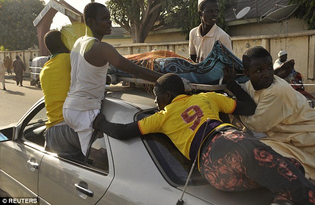 Locals transport the remains to Murtala Mohammed specialist hospital for burial according to Muslim rites