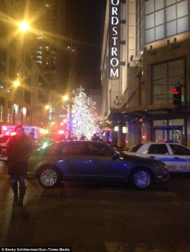 Deadly: The woman, who is a seasonal employee at the store, is in a critical condition fighting for her life. The man was pronounced dead at the scene