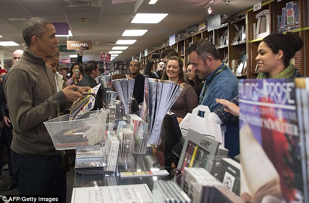 Shopping trip: The President picked up Heart of Darkness - which has anti-West undertones - on a visit to a Washington book store