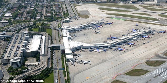Clogged up: Travelers reported that the queue went the entire way through the terminal. Pictured is an aerial view of Midway