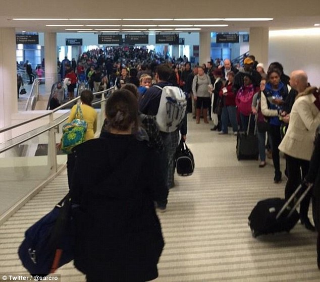 Heaving: Passengers say the intimidatingly long line managed to move quickly, though some did miss flights