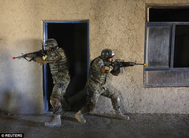 Well-equipped members of the Afghan National Army, pictured, have been training in Kabul