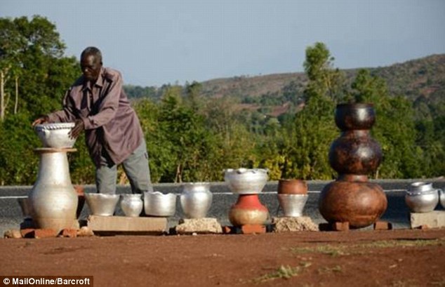Bitter: Mercy's 69-year-old grandfather, who ekes out a living selling pots from a roadside stall, said that the first time he heard Mercy James was in the country was in newspaper reports