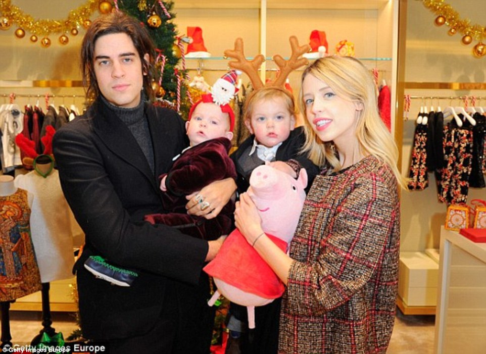 Peaches, Mr Cohen
wife  and their two sons Phaedra and Astala pictured at a Christmas event before her death