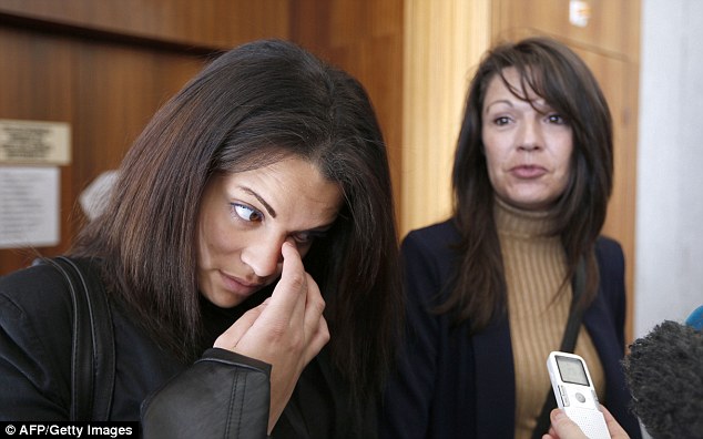 Emotional: Manon Serrano wipes away tears as she speaks to media outside court after the damages hearing