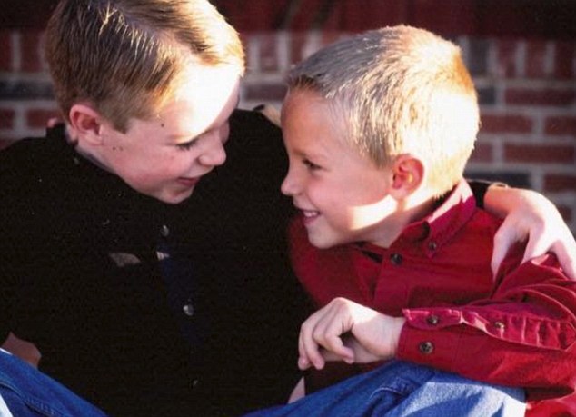 Siblings: Ms Roberts uploaded this photo of Jackson and his brother to Facebook following the fatal shooting