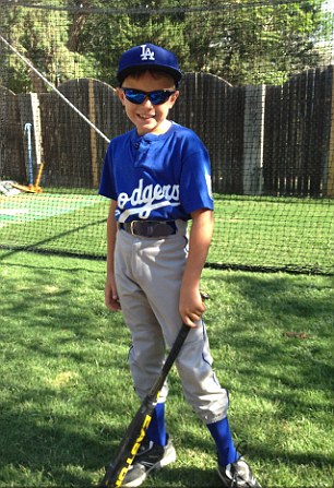 Talented: A memorial service will be held at 11am on Thursday at Lake Ridge United Methodist Church. The family is raising money for funeral costs. Above, Jackson in baseball gear (right) and playing the game (left)