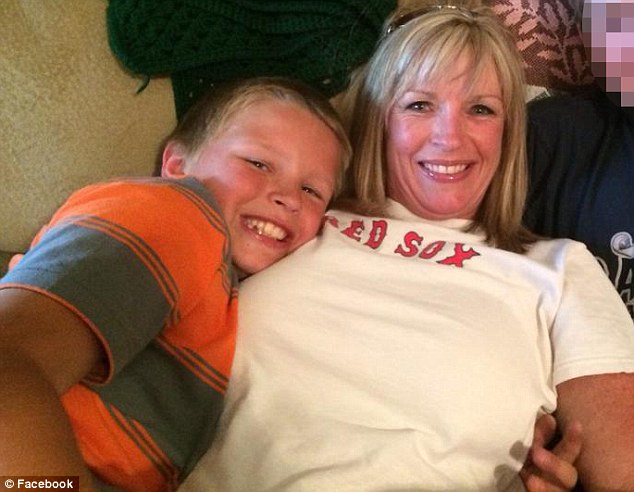 Mother and son: Although she did not write anything, Ms Robert's (right) Facebook friends offered her words of support and paid tribute to Jackson (left), whose brother is not being identified by MailOnline