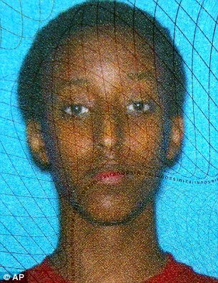 Victim: Abdisamad (left and right), from Missouri, was reportedly heading to play basketball on Thursday when Aden crashed into him so violently that he 'flew through the air', according to a probable cause affidavit