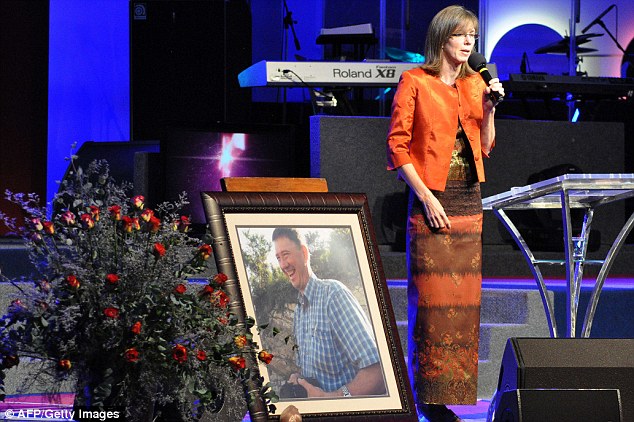 Yolande Korkie, gives a eulogy during the funeral of her slain husband Pierre, who was killed in Yemen