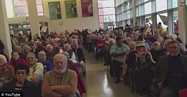NOT AMUSED: The audience sat and watched the drama unfold but never got to ask the senator any questions after the meeting was hijacked
