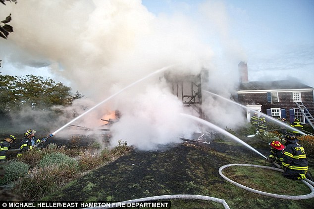 Nearly 80 firefighters attended the scene in the Hamptons but could not stop the blaze roaring through the building 