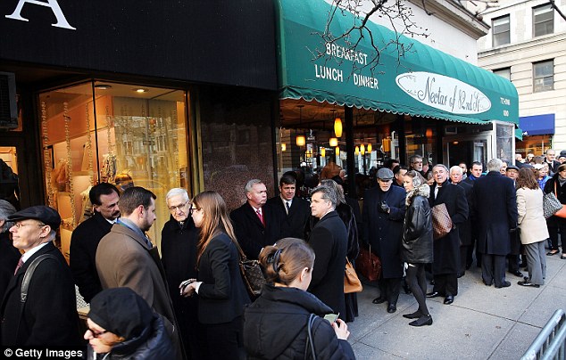 Throngs: Hundreds were seen waiting outside the wake, which some said would be unusual for most politicians