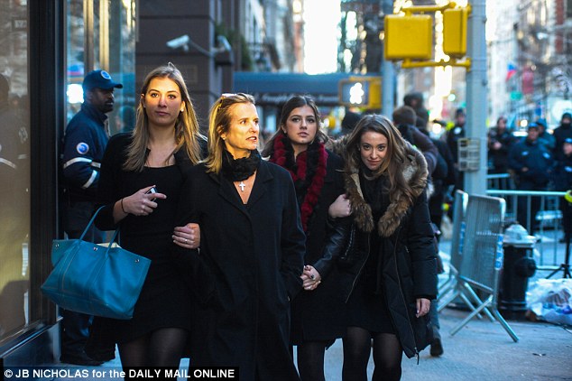 Famous faces: Kerredy Kennedy, center, approaches the event, with one of Andrew Cuomo's daughters in the background