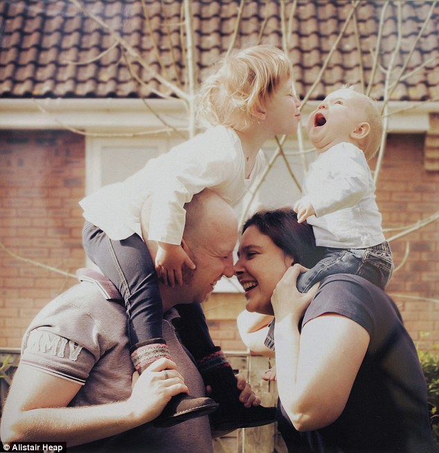 Karen and Richard with their two daughters Freyja and Emily. When the children are older, Karen says she will tell them all about her old life before they were born