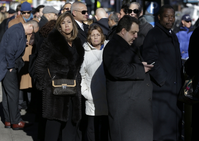 Lines: Attendees wait in line during the wake of former New York Gov. Mario Cuomo, Monday, Jan. 5, 2015, in New York