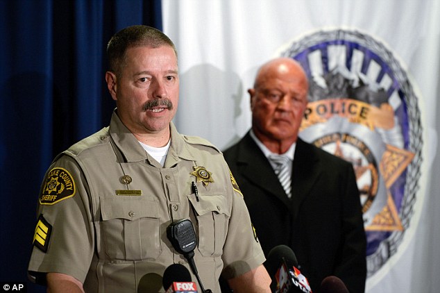 Salt Lake County Sheriff's Sgt. Terry Wall, left, and two other Utah police officers returning from the funeral of a slain New York City officer helped restrain an unruly airline passenger as the plane was diverted to Chicago