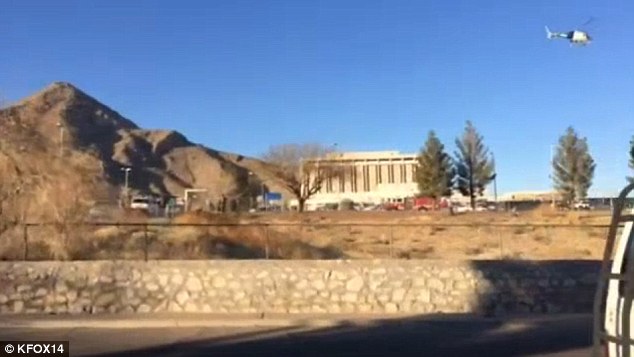 There are reports of an active shooting at the VA clinic next to the William Beaumont Army Medical Center.  Above, a helicopter hovers over the center Tuesday afternoon