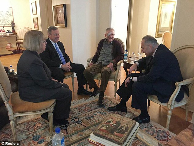A recovering Harry Reid  meets with members of his leadership team at home, before he returns to Congress
