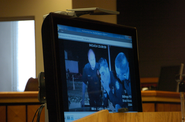 Police video footage of the April 2014 shooting of Richard Ramirez by Billings Police Officer Grant Morrison, (screen) is shown to a seven-person jury in Billings, Montana