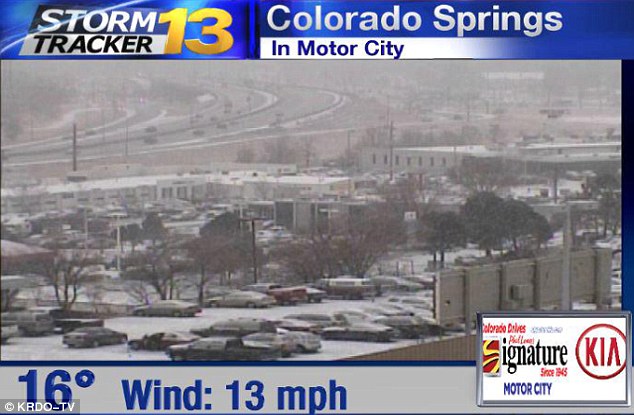 Freezing: The channel has been warning viewers about the freezing temperatures across Colorado Springs. It was 11F (-11.7C) with wind chills when Fink tried to film his shot on Saturday night