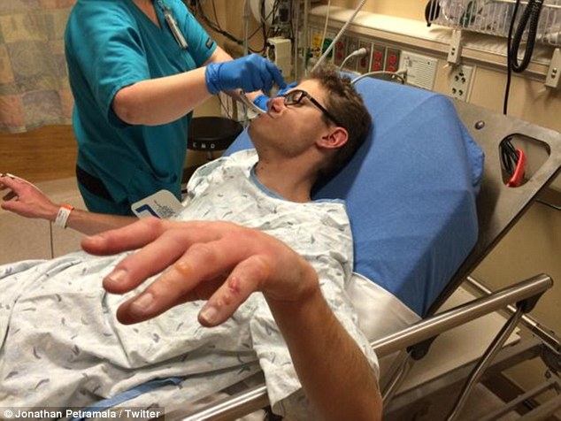 Hospitalized: Eric Fink, a reporter for KRDO in Colorado Springs, is pictured receiving treatment in hospital after he suffered frostbite while reporting in freezing temperatures on Saturday night