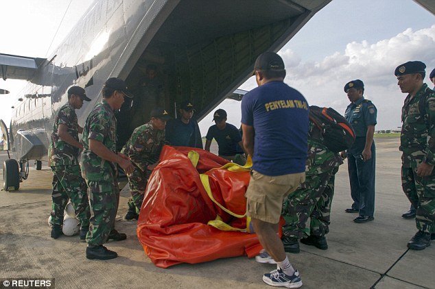 Inclement weather has hampered recovery efforts by Indonesian and international personnel