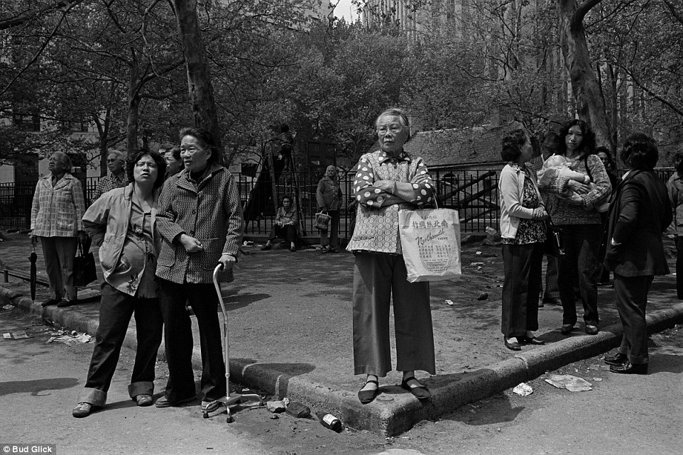 Congregation: Women stand and chat at Columbus Park in 1983