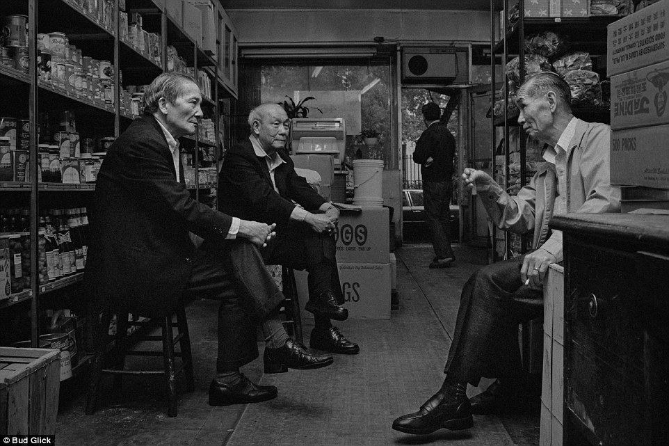 Moving out: Men sit in a store on Mulberry St in 1982. At the time the area was predominantly full of older men