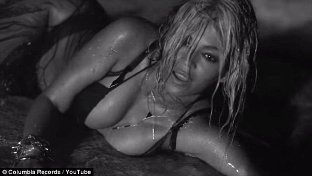 The music video for 'Drunk in Love,' the song Huckabee criticizes in his book, includes explicit lyrics and images of a sultry Beyonce strutting on a beach