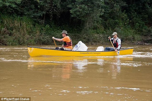 Canoeists paddle along Brazil's Rio Maicuru in Monte Alegre where the girl died (file picture)
