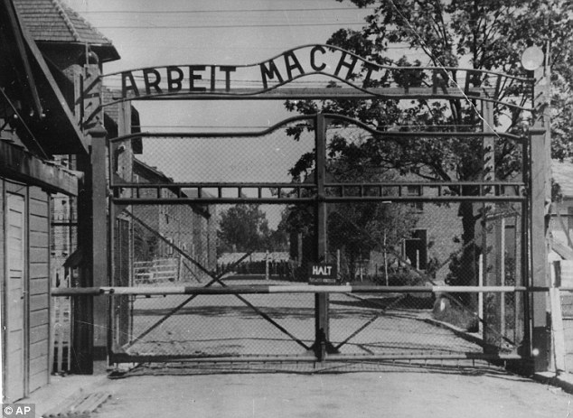The sale is happening just days after the 70th anniversary of the liberation of Auschwitz. Pictured: The gates of the notorious concentration camp