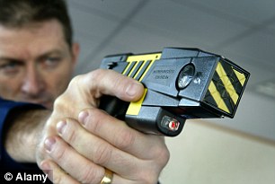 The driver was shot twice with the Taser after the responding officer thought he was going for a weapon (file photo)