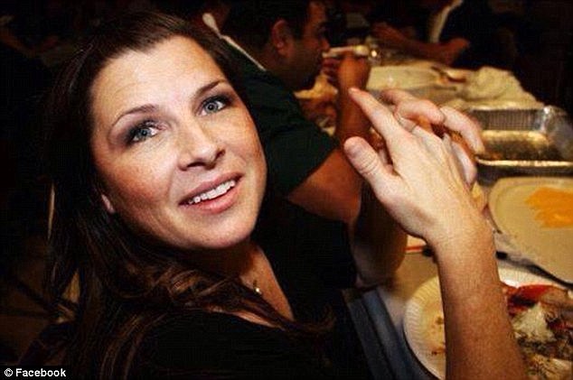 Claim: The family of Misty Holt-Singh, 41, filed a claim Wednesday that officers acted negligently and broke protocol, which may have resulted in her death during a shootout between bank robbers and police