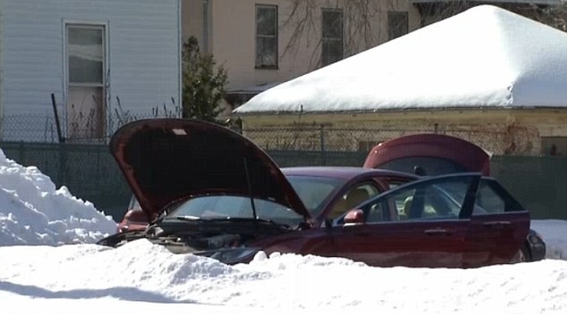 New Britain Police Chief James Wardwell said the man was kept in the vehicle (pictured) while officers 'cleared the area of residents and shut down nearby roadways' 