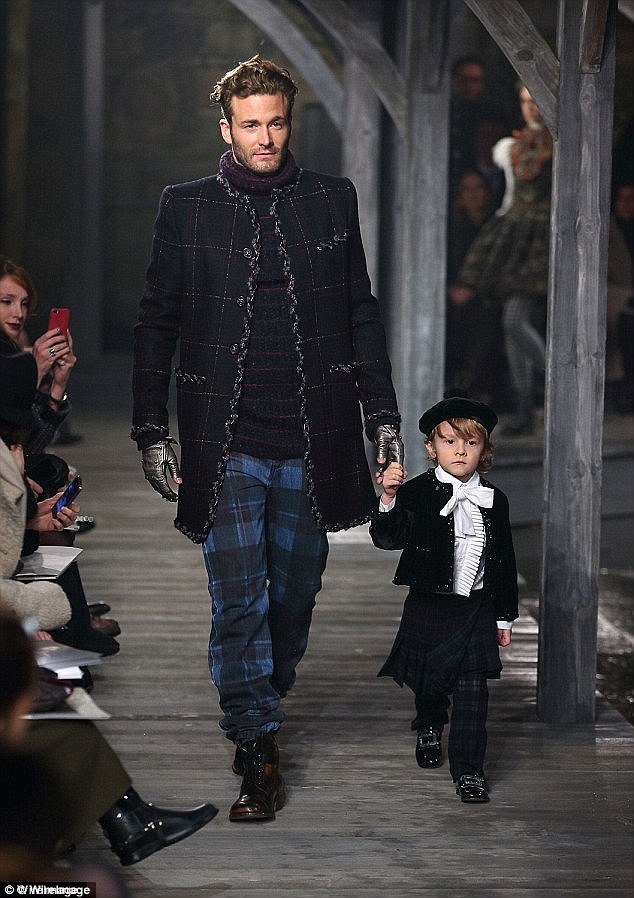 Brad and Hudson Kroenig on the Chanel catwalk in 2012 