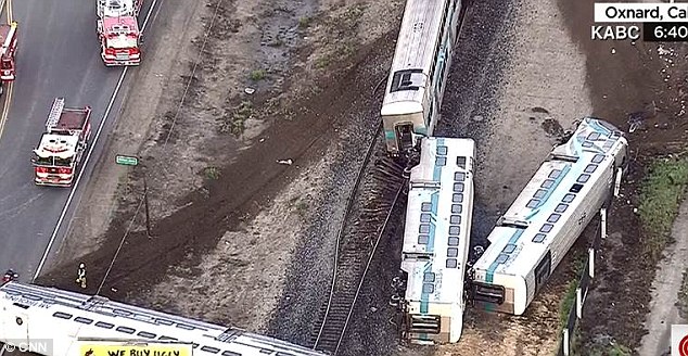 Video shot from a helicopter revealed train carriages overturned after the crash. At least 30 are injured according to officials