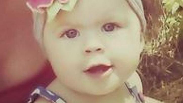 Lily Groesbeck, 18 months old, survived hanging upside down in a submerged car for 12 hours