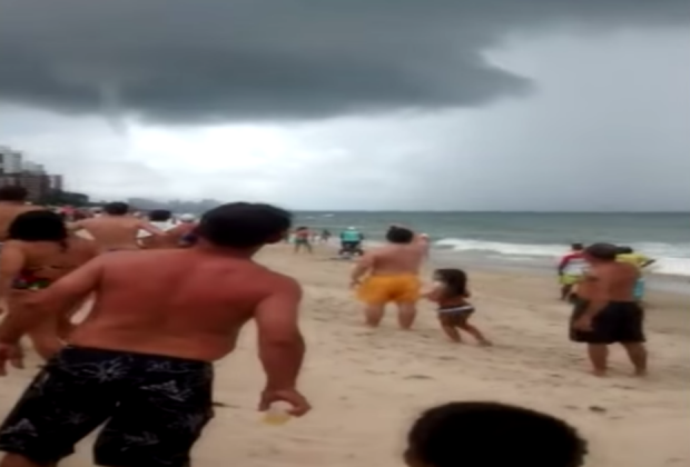 Watch: People are hurled into the air as waterspout rips into beach